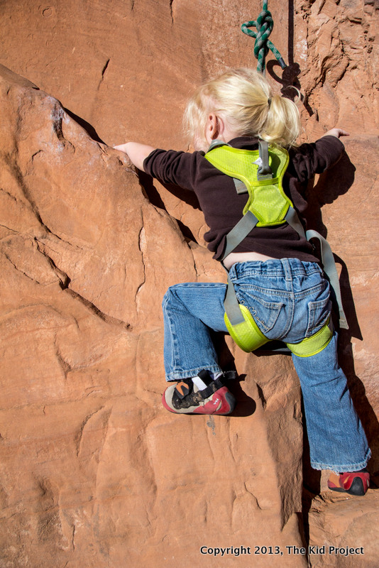 2 year old girl climbing near moab