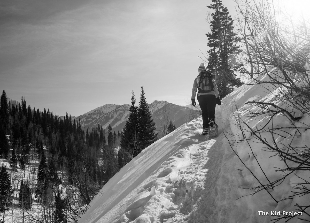 Tubbs snowshoes, ascending hill Wasatch Range, UT