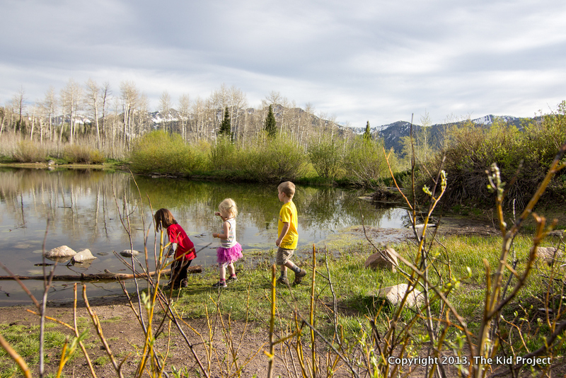 kids playing by lake