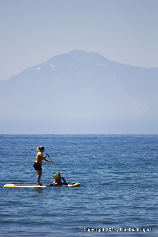 mom and daughter SUP on lake Tahoe