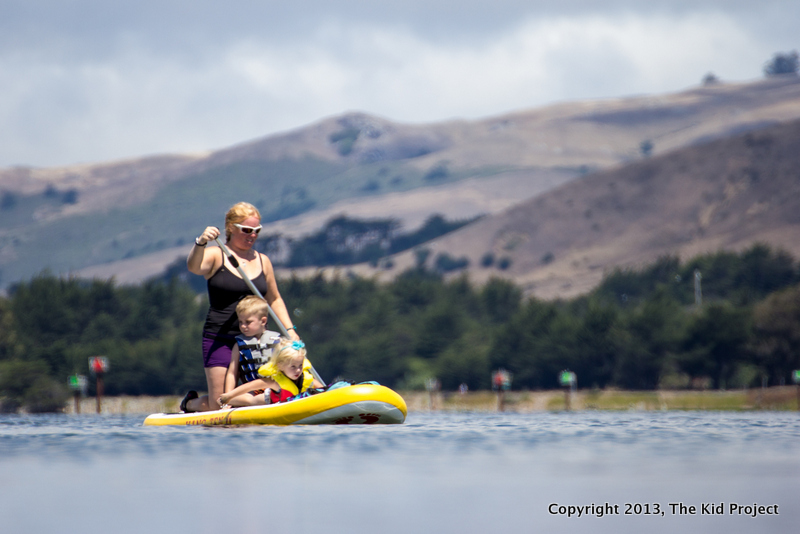 family paddling on bodega harbor