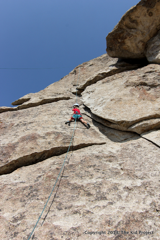 Seven year old girl climbing