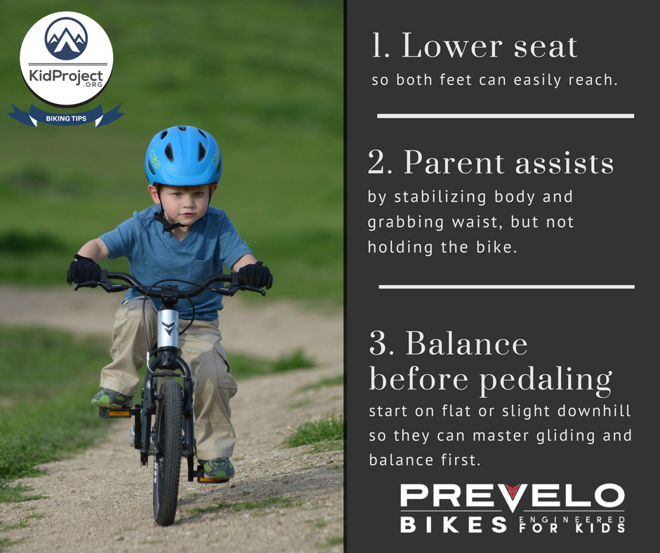 teaching a kid to bike