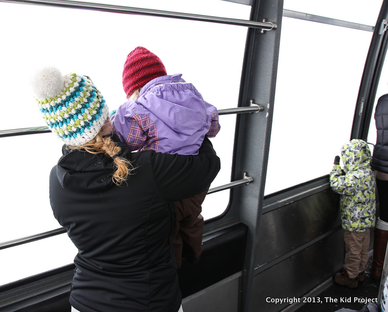 mom and daughter for a tram ride