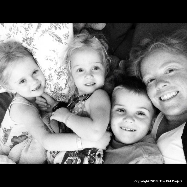 mom and kids, on bed