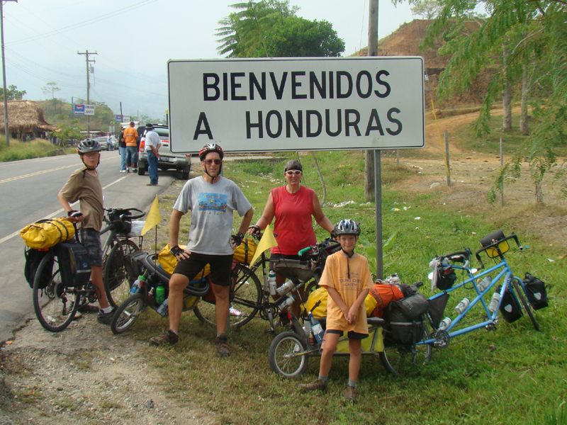 welcome to honduras, family on bikes