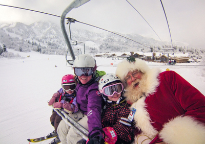 santa on a ski lift