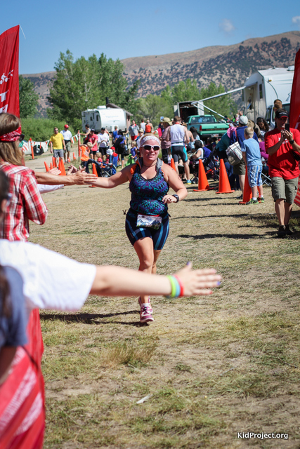 racing to the finish line, running at Echo Tri