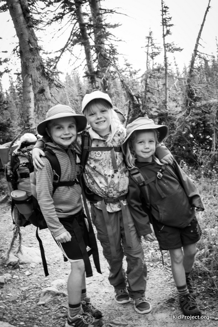 Three siblings backpacking in the high Uintas,