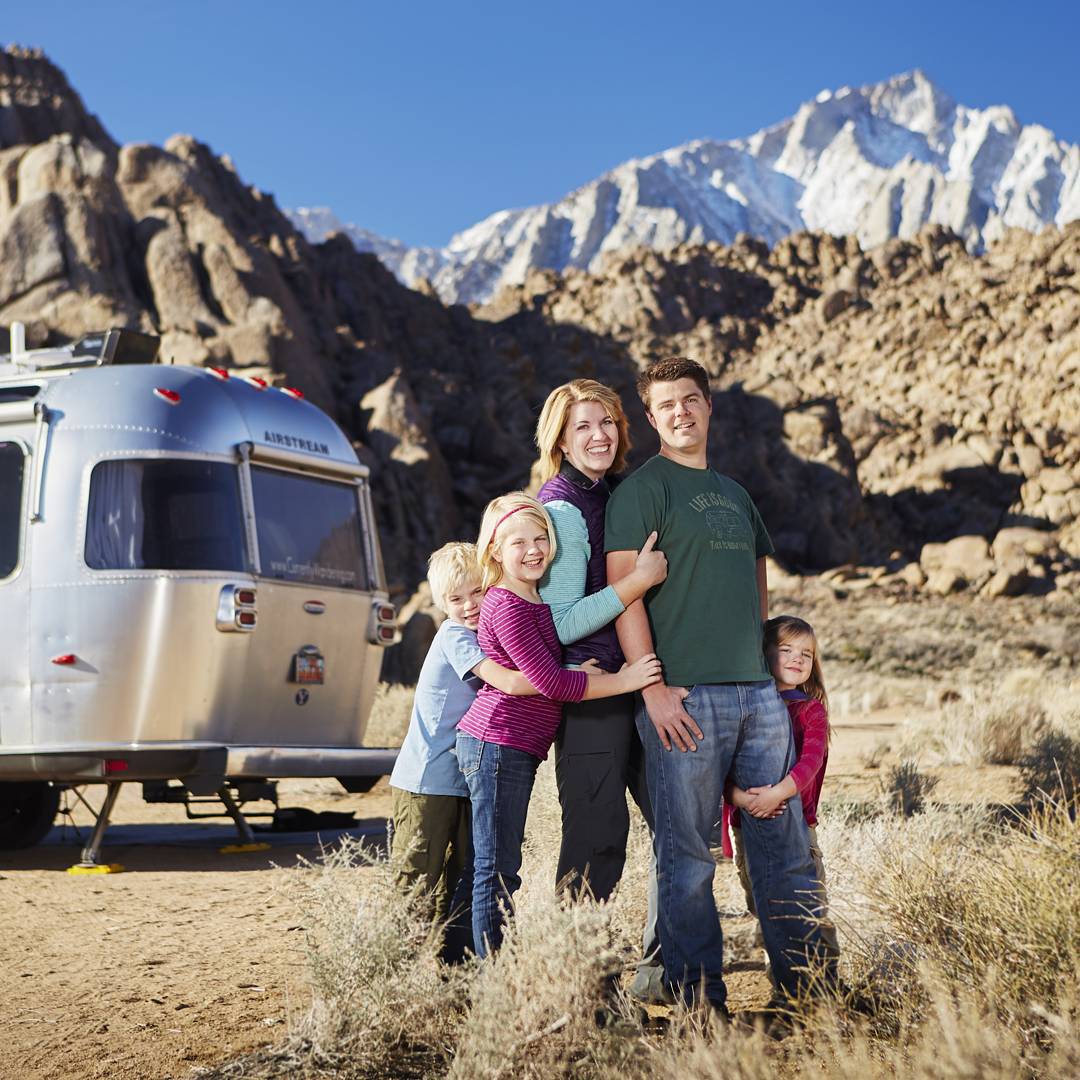 Follow @CurrentlyWandering on IG to keep up with their adventures! | Let's throwback to last winter when @sethkhughes captured us, our Airstream and Mt. Whitney in the Alabama Hills. Love this crazy family of mine!