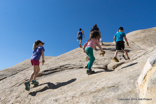 hiking over sandstone Capitol Reef